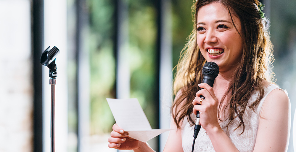 Girl making speech with microphone experiencing social anxiety