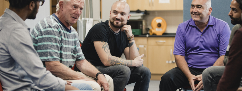 Men in a Support Group with mental health psychologist