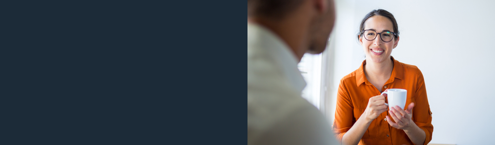 Slider image with woman in orange shirt holding a mug talking to a man