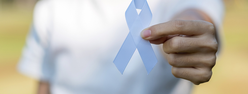 Woman holding white ribbon