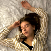 Woman sleeping on bed