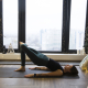 Woman doing yoga to look after her mental health at christmas