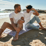 Young gay couple at beach