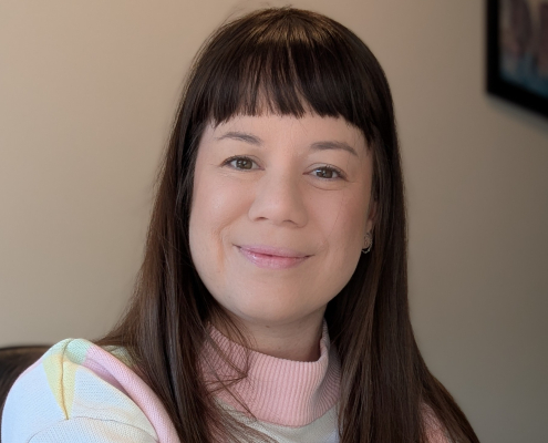 Professional headshot image of Emma Fenton