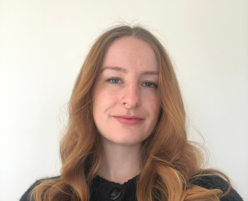 Photo of Amber from shoulders up against a white background