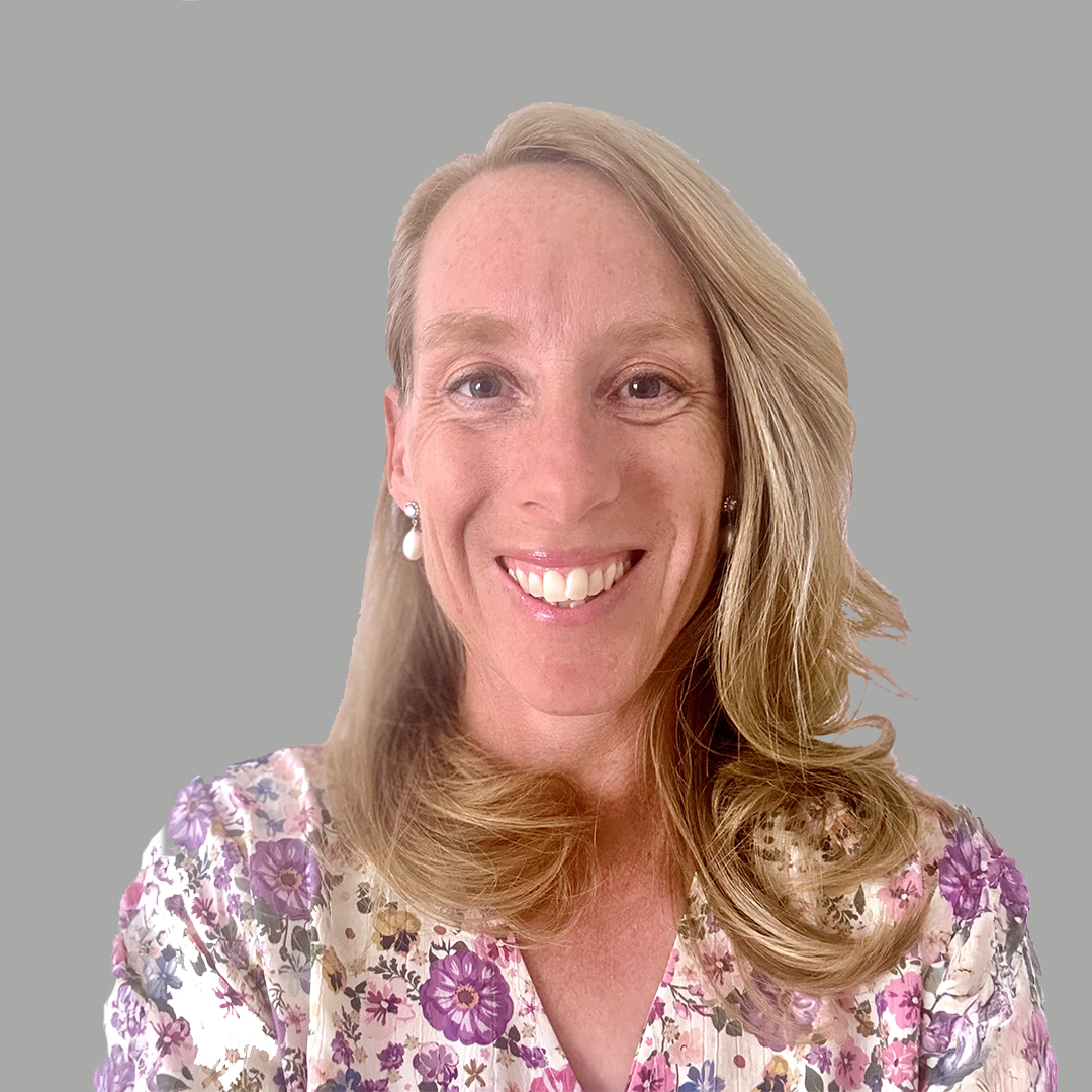 Professional headshot of smiling woman against a plain grey background, Kate Robinson